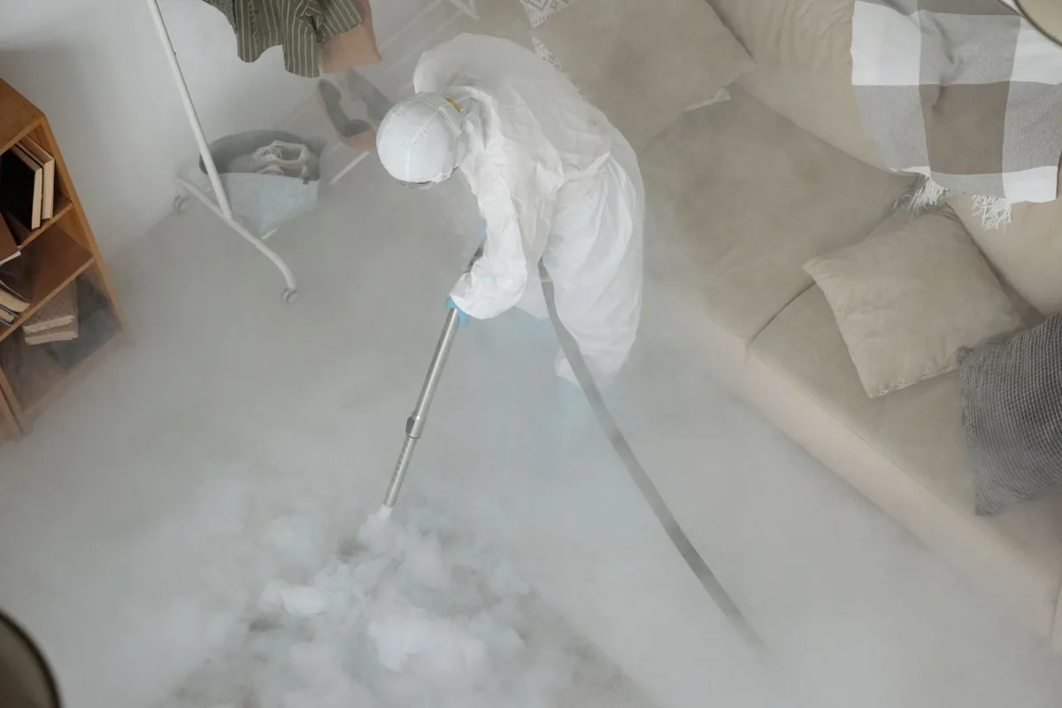 Biohazard cleanup technician in protective equipment, Farr West, UT
